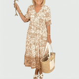 Constance | Midi-Kleid mit floralem Border-Print und gestuftem Saum