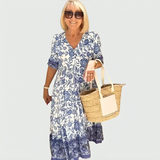 Constance | Midi-Kleid mit floralem Border-Print und gestuftem Saum