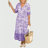 Constance | Midi-Kleid mit floralem Border-Print und gestuftem Saum