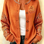 Maria | Langärmliger, bequemer Cardigan mit Halloween-Kürbismuster und Vintage-Print