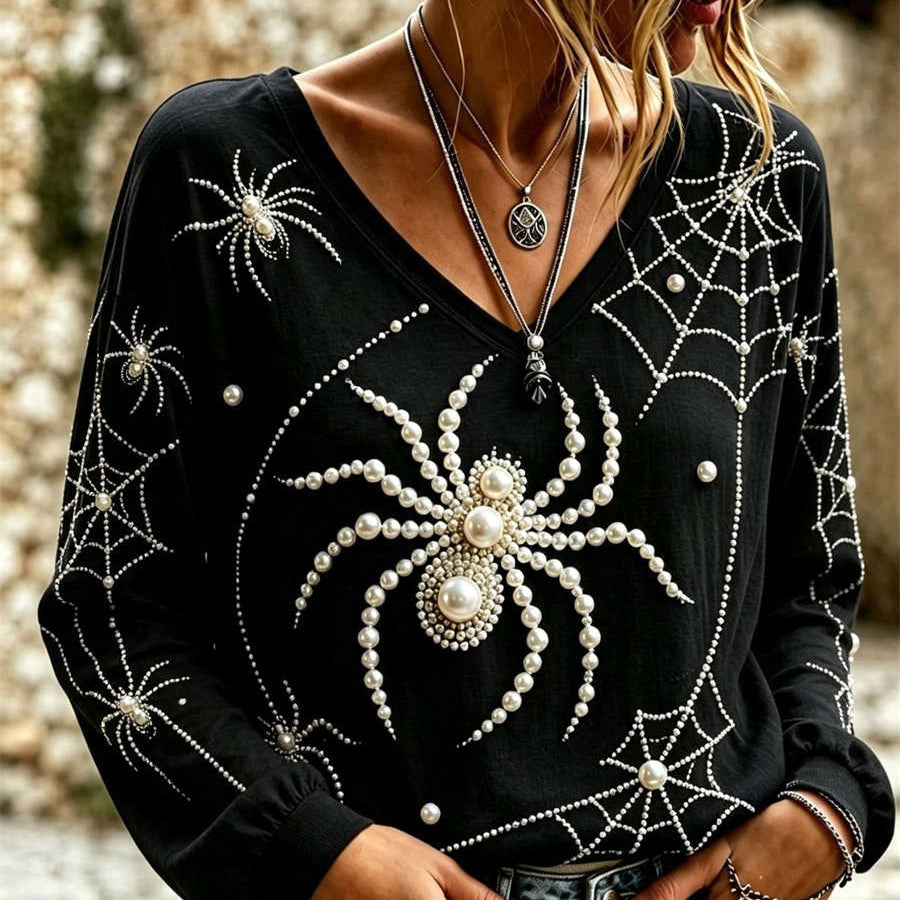 Matilda | Halloween-inspirierte schwarze Langarmbluse mit Spinnennetz-Perlenmuster und V-Ausschnitt