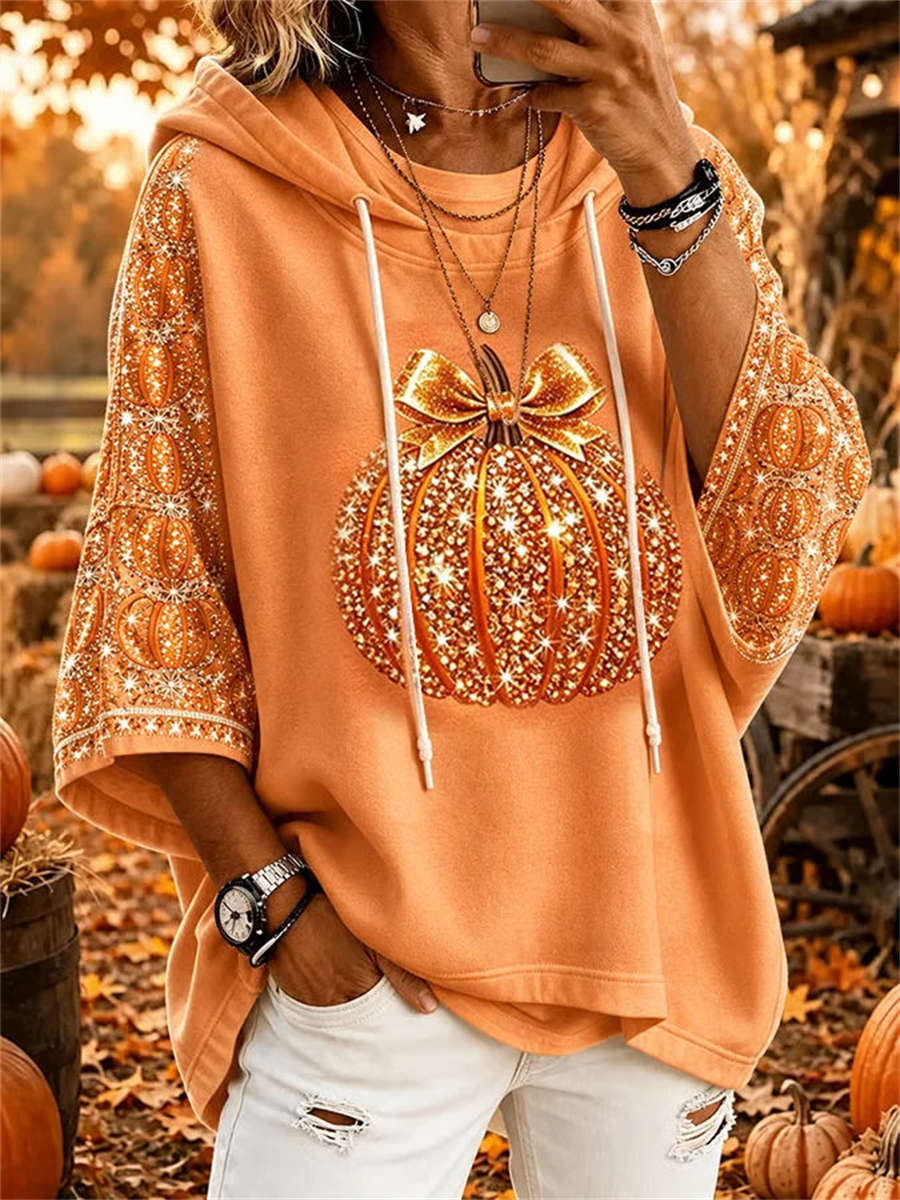 Laura | Halloween-inspirierter Kapuzenpullover mit orangefarbener Schleife und Kürbismuster und Dreiviertelärmeln