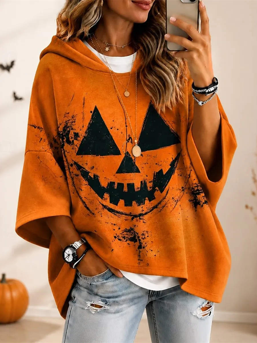Aria | Halloween-inspirierter orangefarbener Kürbisgesichts-Hoodie mit Dreiviertelärmeln