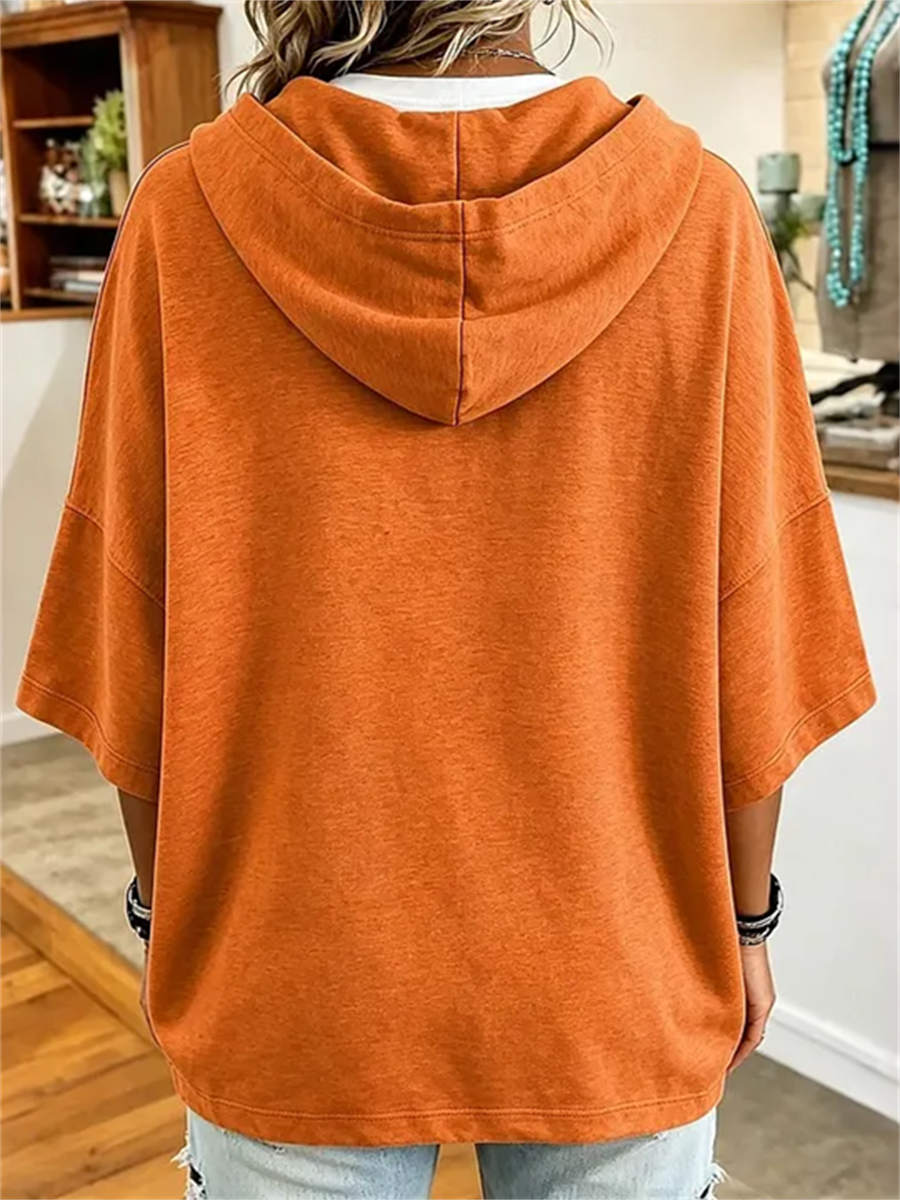 Aria | Halloween-inspirierter orangefarbener Kürbisgesichts-Hoodie mit Dreiviertelärmeln