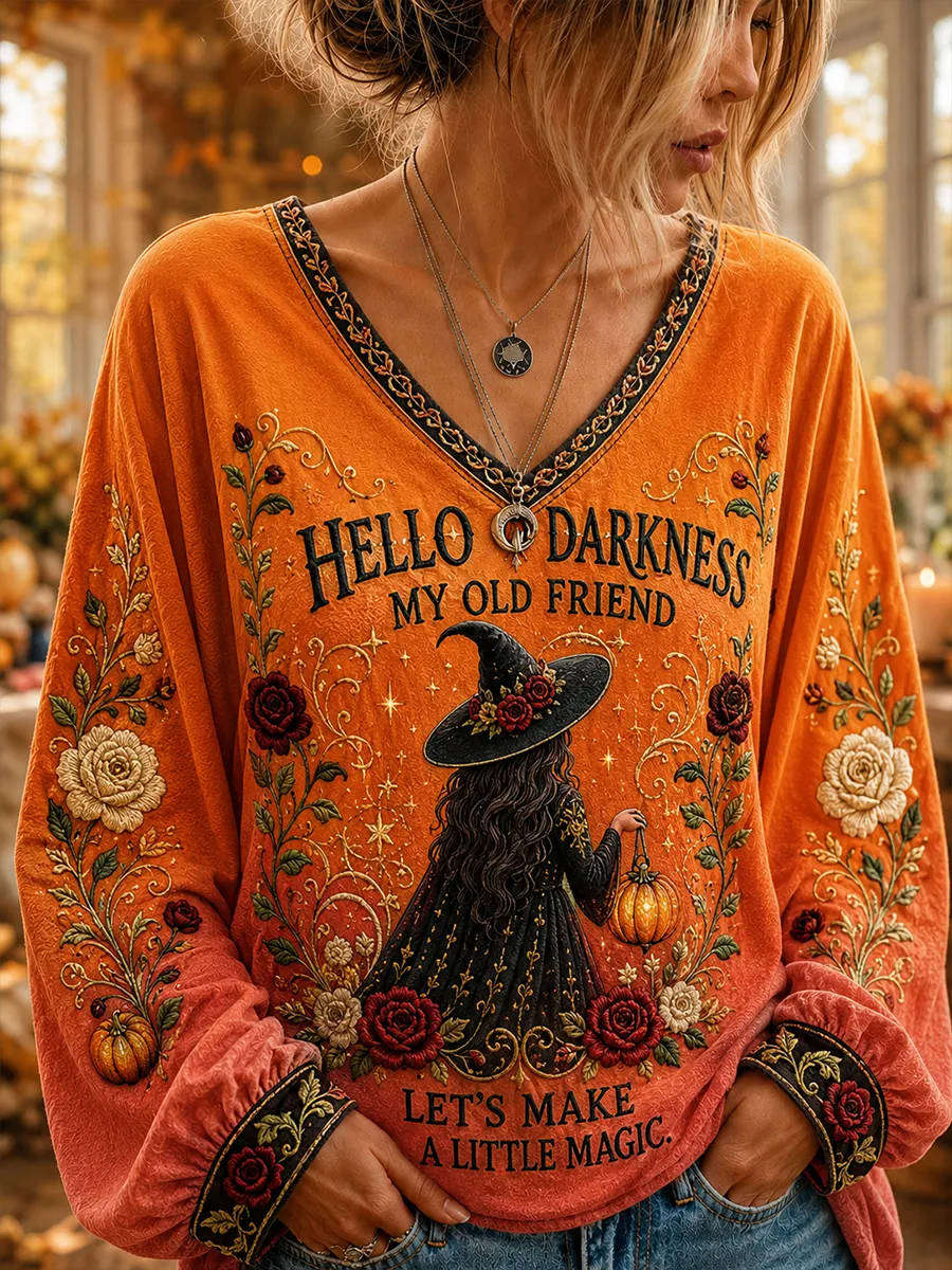 Callie | Halloween-inspiriertes orangefarbenes Hexen-Langarmoberteil mit floralem Buchstabendruck und V-Ausschnitt