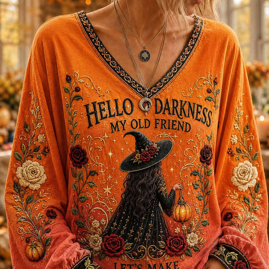 Callie | Halloween-inspiriertes orangefarbenes Hexen-Langarmoberteil mit floralem Buchstabendruck und V-Ausschnitt