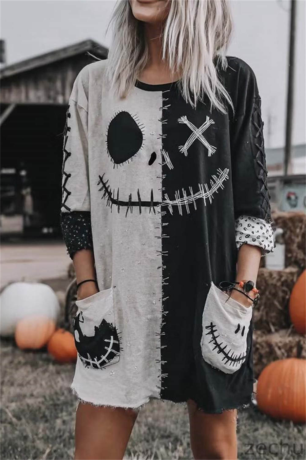 Ines | Halloween-inspiriertes Minikleid mit mehreren gruseligen Gesichtern und Rundhalsausschnitt und langen Ärmeln