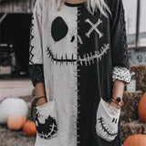 Ines | Halloween-inspiriertes Minikleid mit mehreren gruseligen Gesichtern und Rundhalsausschnitt und langen Ärmeln