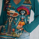 Andrea | Von Halloween inspirierte, blaugrüne Langarmbluse mit Skelett-Print und V-Ausschnitt