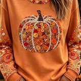 Willow | Halloween-inspiriertes Rundhals-Oberteil mit orangefarbenen Knöpfen und Kürbisblättern