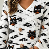 Francesca | Von Halloween inspiriertes, weißes, langärmliges Oberteil mit Kürbisgesicht und Katzenmuster und V-Ausschnitt