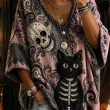 Ada | Halloween-inspiriertes Oberteil mit mehrfarbigem Totenkopf-Katzen-Print, V-Ausschnitt und dreiviertellangen Ärmeln