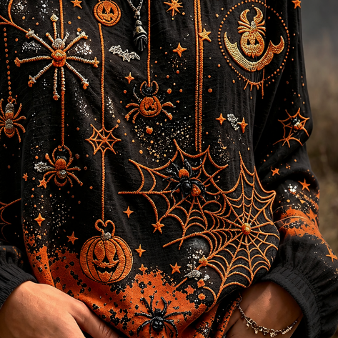 Josephine | Halloween-inspirierte, langärmlige Bluse mit Spinnennetz-Kürbis-Print und Rundhalsausschnitt