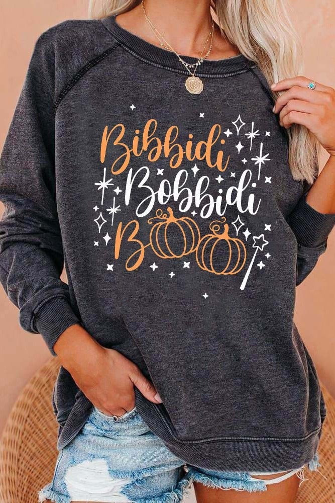 Dora | Langarm-Sweatshirt mit Rundhalsausschnitt und Halloween-inspiriertem Buchstabendruck