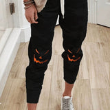 Eileen | Hose mit Halloween-inspiriertem Kürbis-Print und Taschen