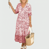 Constance | Midi-Kleid mit floralem Border-Print und gestuftem Saum