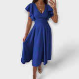 Elegantes V-Ausschnitt-Kleid mit fließender Silhouette